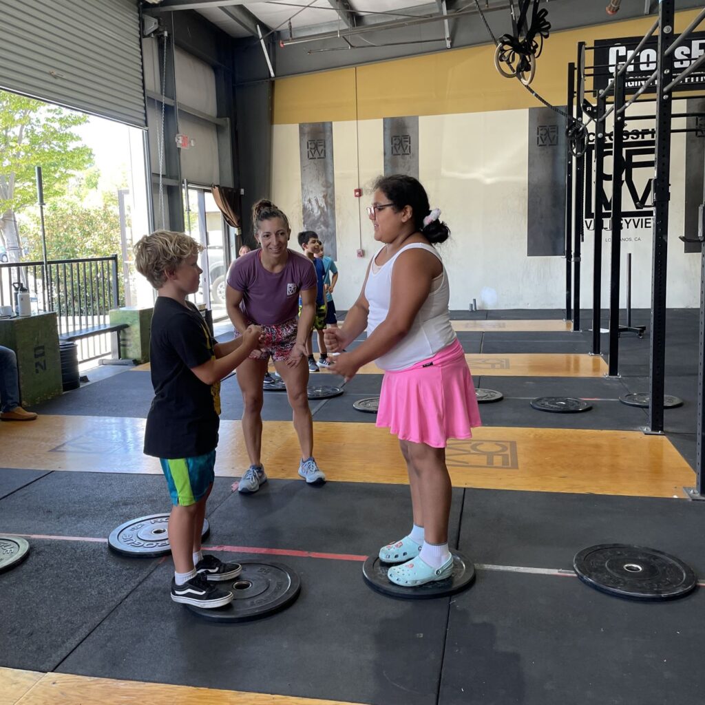 Kids playing rock paper scissors